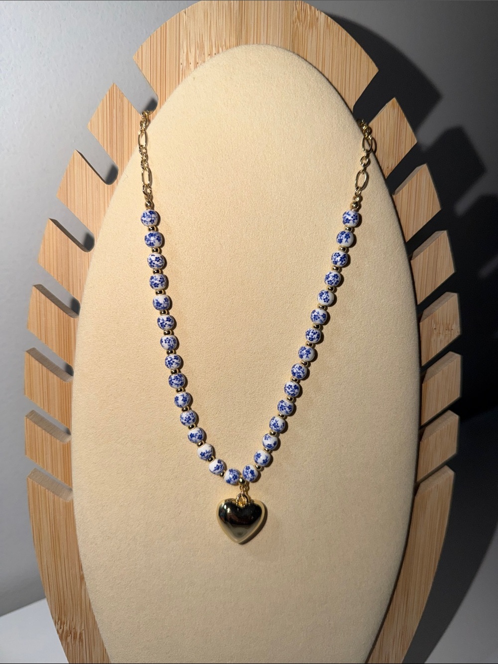 Gold Heart Pendant Necklace with Blue and White Beads